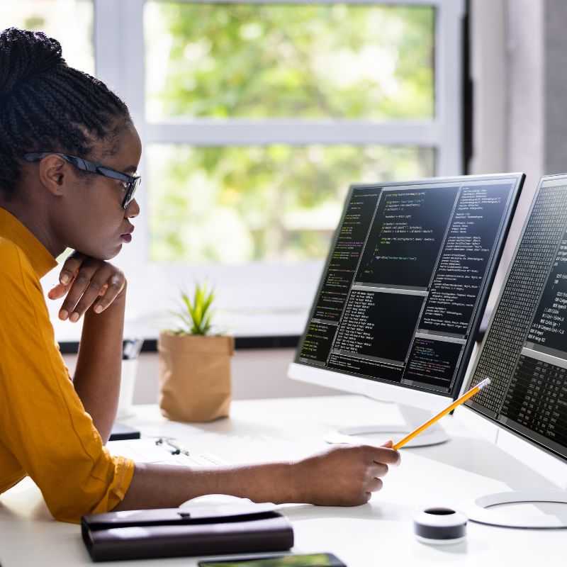 African female web designer at work at The Webmakers.