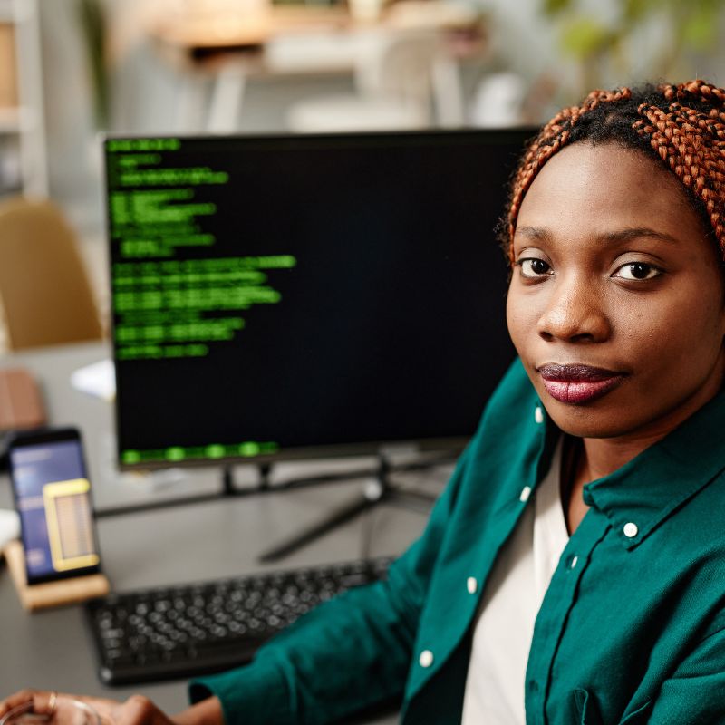 African female web developer at work.