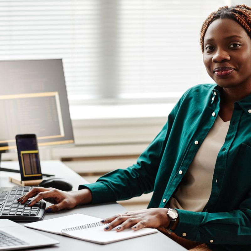 African female programmer at work.