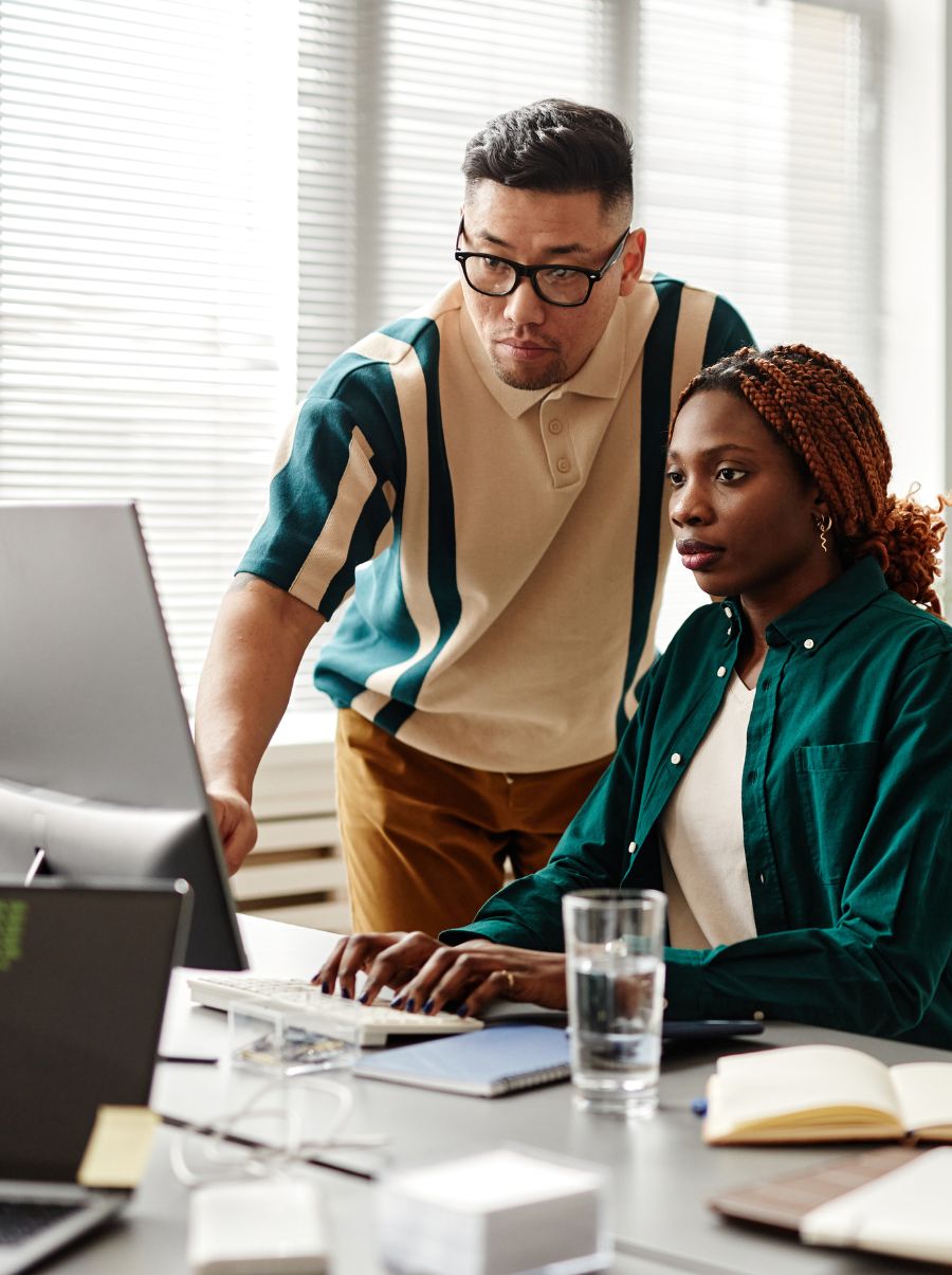 A male and female programmer at The Webmakers.